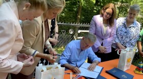 Gov. Ned Lamont during a bill signing ceremony Tuesday June 18, 2024 at the Friends Center for Children in New Haven. L to R, State Rep. Kathleen McCarty, State Rep. Michelle Cook, State Rep. Kate Farrar, Early Childhood Commissioner Beth Bye.