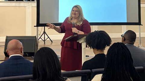 U.S. Rep. Kat Cammack discusses health care challenges during the UF Health Cancer Institute's cancer disparities research showcase on Thursday, Oct. 22, 2026. (Emilia Hueller/WUFT News)