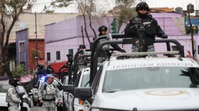 National Guards patrol the area outside of the General Prosecutor's headquarters in Mexico City, Sunday, Feb. 22, 2026, after authorities reported that the Mexican Army killed Jalisco New Generation Cartel leader Nemesio Oseguera, known as "El Mencho."