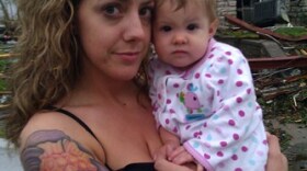 Tiffany Osborne and her daughter, Tatum, took shelter in a basement during the tornado.