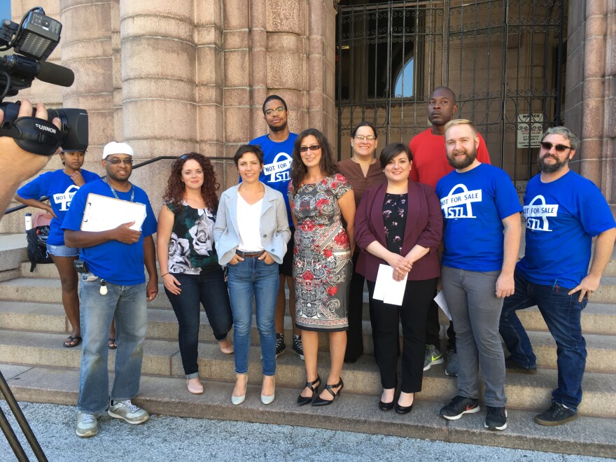 STL Not For Sale, a grassroots group opposed to privatization of St. Louis Lambert International Airport, held a press conference at City Hall to protest a survey that seeks 'input' from residents on privatization.