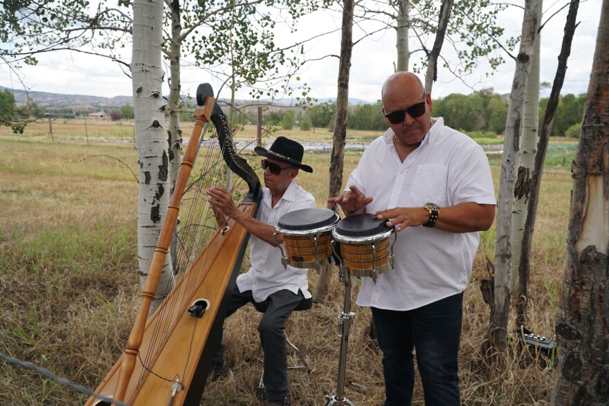 Eligio and Coco Garcia perform at the Art on the Trails