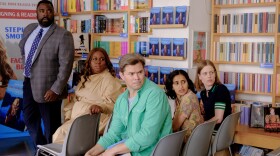 (L to R): Detective Summerville (Bashir Salahuddin), Vicky (Alex Newell), Darren (Andrew Rannells), Sona (Aparna Nancherla) and Stacey (Kelly McCormack) in ANOTHER SIMPLE FAVOR.