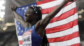 United States' Tori Bowie celebrates after winning the gold medal in the Women's 100m final during the World Athletics Championships in London Sunday, Aug. 6, 2017. (David J. Phillip/AP)
