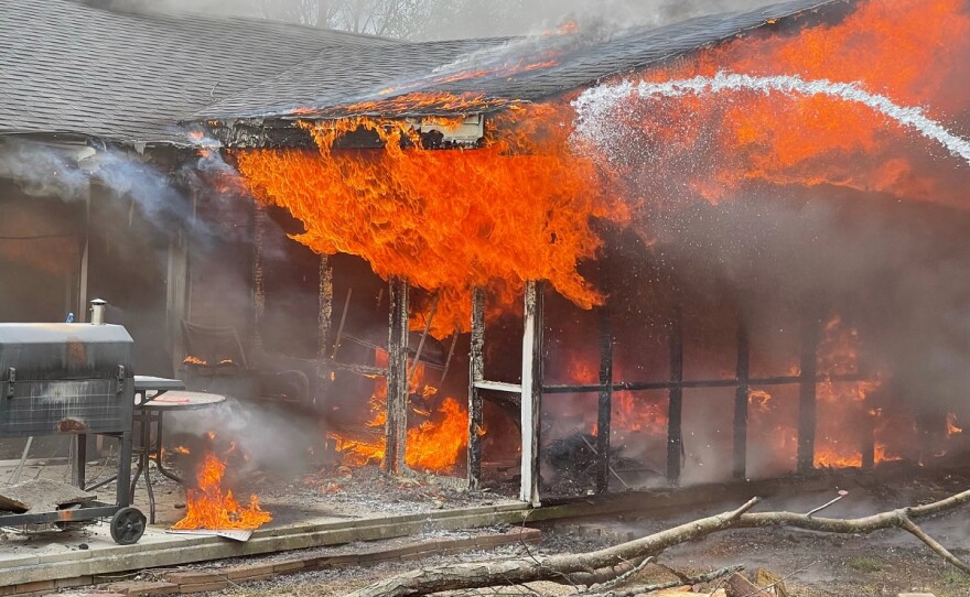 Flames from a house fire