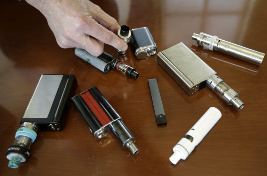 Vape shops in Massachusetts are shutting down in response to Gov. Charlie Baker's ban. (Steven Senne/AP)