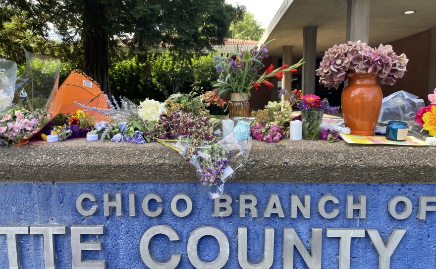 Flowers are left outside the Butte County Library in Chico, Calif. on June 25, 2026.