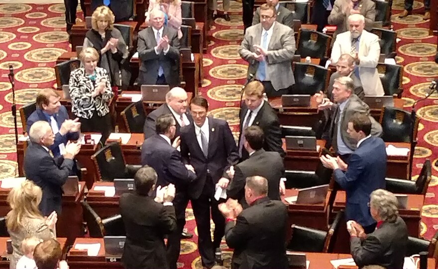 Outgoing Missouri House Speaker Todd Richardson shakes hands with lawmakers after emotional departure address, May 18, 2018.