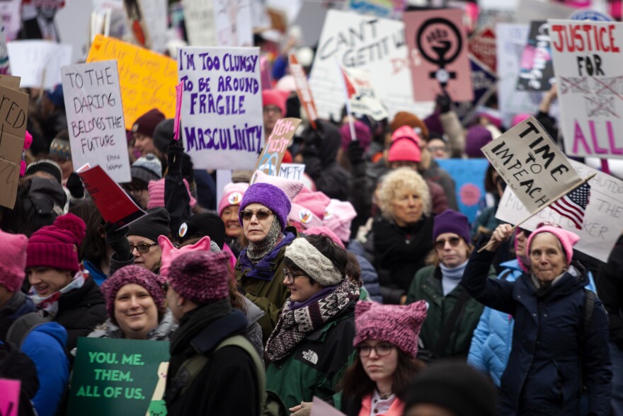 In Washington, crowds of people, many wearing pink hats, marched from Freedom Plaza down Pennsylvania Avenue.