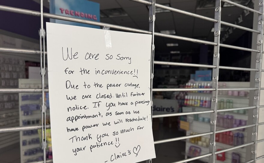 Claire's, an ear piercing and jewelry store chain, had this sign on the gate apologizing for the power outage. 