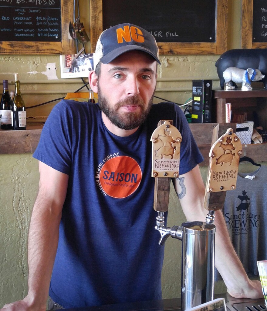Joe Dinan, co-owner of Sanctuary Brewing in Hendersonville, N.C., says his subsidized health coverage under the Affordable Care Act paid for his skin cancer surgery this year.