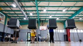 Voters cast their ballots during the primary election in Windsor, Conn., Aug. 11, 2026.