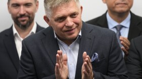 Chairman of Smer-Social Democracy party Robert Fico, center, adresses the results of an early parliamentary election during a press conference in Bratislava, Slovakia, on Sunday, Oct. 1, 2023.