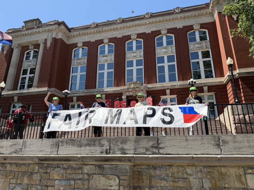 Demonstrators rally near the Missouri Supreme Court after judges heard arguments in redistricting cases. The high court unanimously ruled that a GOP-friendly map is in effect now even though opponents turned in referendum signatures.