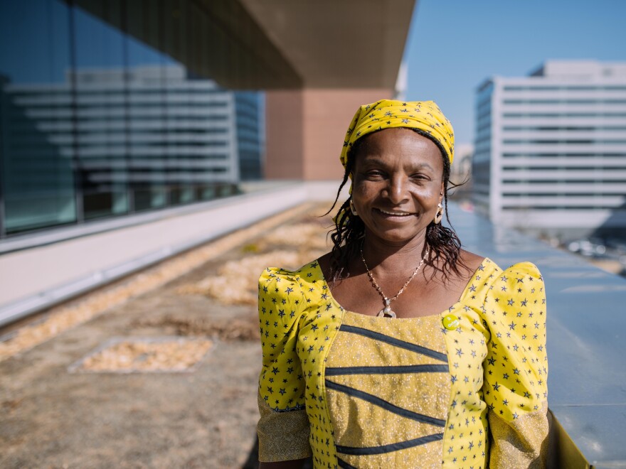 Monica Maigari, a <em>Female Food Heroes</em> contestant from Nigeria, is visiting Washington, D.C., for the first time on a trip sponsored by Oxfam. She says NPR's rooftop garden, where she is pictured, is "great for carrots and tomatoes."