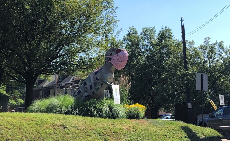 dinosaur with mask in aspinwall.jpg