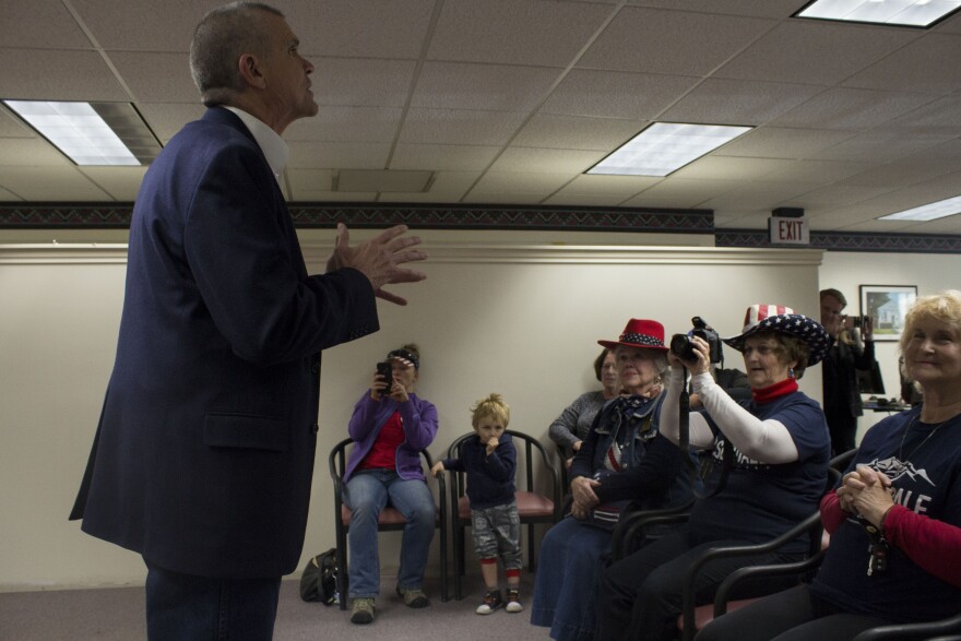 Republican Matt Rosendale speaks with voters at the GOP office in Helena.