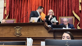 Speaker Joe Shekarchi conferring last year with House Fiscal Adviser Sharon Reynolds Ferland