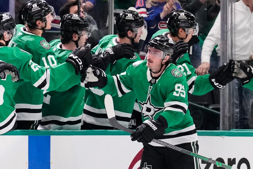 Dallas Stars center Matt Duchene (95) celebrates withe teammates after scoring in the second period of an NHL hockey game against the Seattle Kraken in Dallas, Wednesday, Feb. 25, 2026. (AP Photo/Tony Gutierrez)