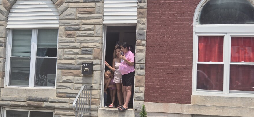 Excited families, many of them Latino, expressed gratitude for the marchers demonstrating in solidarity with undocumented people. Photo by Emily Hofstaedter/WYPR.