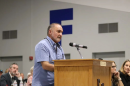 Photo of Darius Assemi at a podium during a hearing.