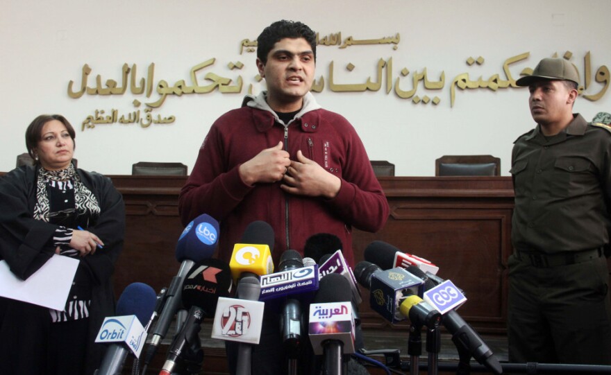 Egyptian army doctor Ahmed Adel speaks during a news conference at a military court in Cairo on March 11. Charged in the case of forced virginity tests on Egyptian protesters last year, he was acquitted.