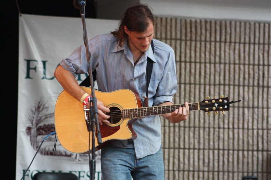 A guitarist at the Florida Folk Festival in more recent years.