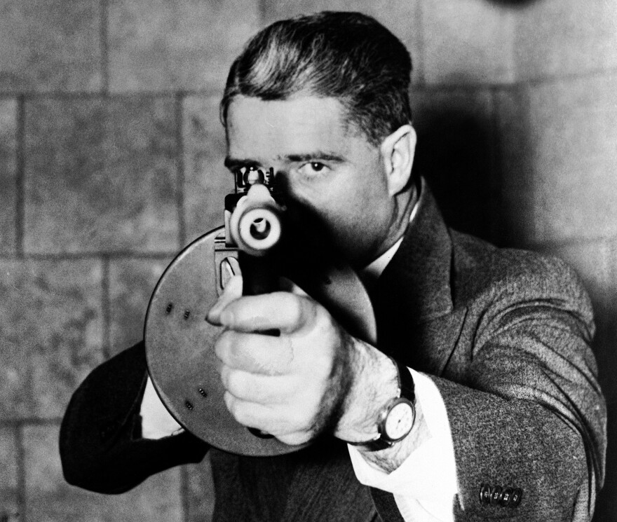 A close up of a typical "G-man" with a machine gun, as part of the Department of Justice's cooperation with the production of the the 1936 film, "You can't get away with it."