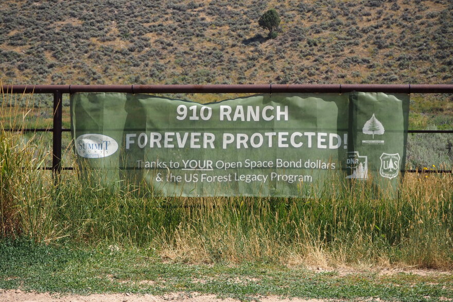 A sign celebrates Summit County's acquisition of the 8,800-acre 910 Ranch, seen here on Aug. 5, 2026.