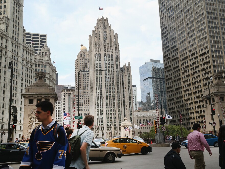 The Tribune Tower, the iconic former home of the Chicago Tribune, seen in Chicago, Illinois in 2015. The <em></em>newspaper lost a quarter of its staff to buyouts after it was acquired by Alden Global Capital in May.