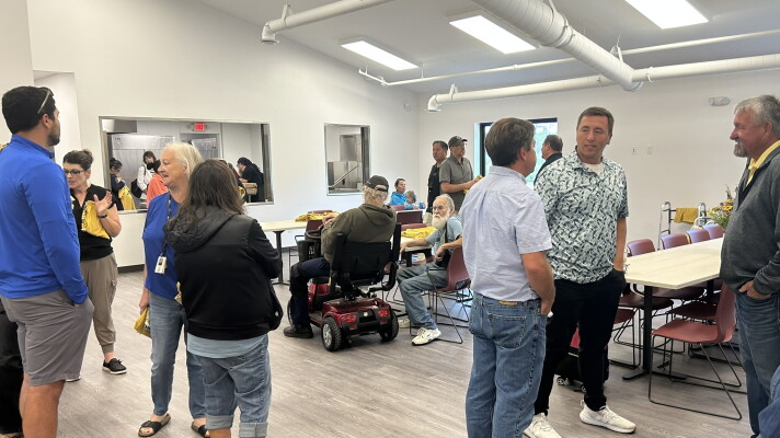 Attendees of the 56-bed Bena shelter ribbon-cutting ceremony gather on Aug. 26, 2026.