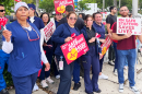 Unionized nurses at three South Florida hospitals rallied outside Palmetto General Hospital in Hialeah on Friday, Nov. 15, 2025, for a new three-year contract, demanding more pay and better patient safety.