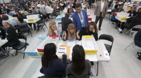 Workers at the Broward County Supervisor of Elections office show Republican and Democrat observers ballots during a hand recount, Friday, Nov. 16, 2018, in Lauderhill, Fla. (Wilfredo Lee/AP)