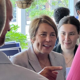 Massachusetts Attorney General Maura Healey chats with supporters during a campaign stop in North Adams. The Democrat is running for governor this year.