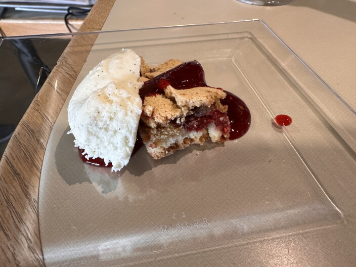 The Raspberry-Walnut Tart with raspberry sauce and ice cream!
