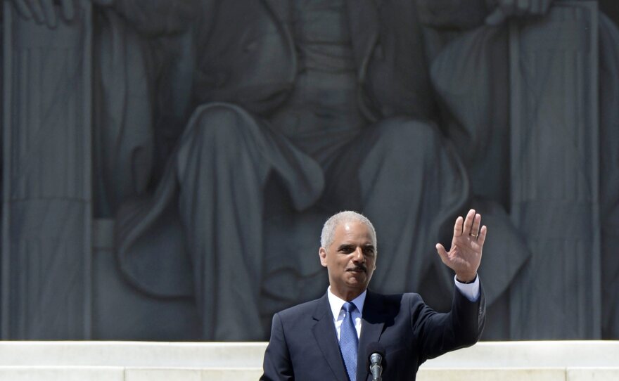 Attorney General Eric Holder speaks on the steps of the Lincoln Memorial during the March on Washington 50th anniversary rally in Washington, D.C., on Saturday.