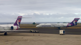 FILE - A Hawaiian Airlines flight arrives at Līhuʻe Airport on Kauaʻi.