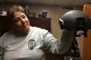 Judson ISD Police Chief Teresa Ramon takes one of the helmets out of the closet in her office, where she also keeps bulletproof vests.