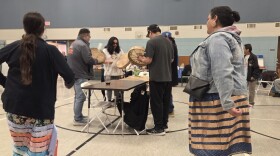 Attendees participate in a round dance in the former Central Elementary School gym, as a soft launch for the Minwaadizi Project's Bemidji space on March 20, 2026.