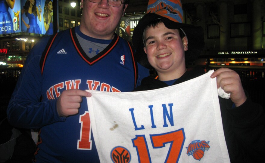 Jeremy and Zach Allen, fans of basketball player Jeremy Lin, attend the Knicks game Wednesday. The 16- and 12-year-old are from Oceanside, Long Island.