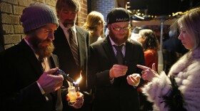 Partygoers attend a Prohibition-era themed New Year's Eve party celebrating the start of retail pot sales, at a bar in Denver on Dec. 31, 2013.