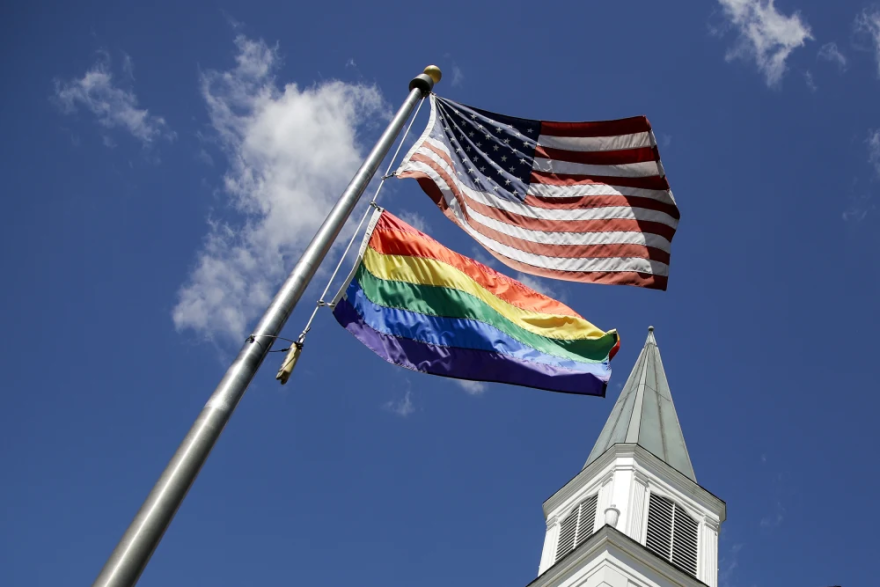 A Pride flag outside Asbury United Methodist Church in Prairie Village, Kan., in 2019. Associated Press