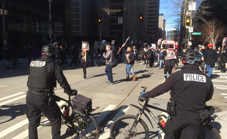 A march protesting the Seattle police shooting of Che Taylor on Feb. 21, 2016 moves through downtown Seattle on Feb. 25, 2016.