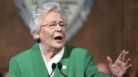 FILE - Alabama Gov. Kay Ivey delivers her State of the State address, March 7, 2023, in Montgomery, Ala. State lawmakers from Mississippi and Alabama are playing each other in softball this weekend to raise money for charity. And, the two Republican governors are placing friendly bets on the outcome. The Battle of Tombigbee takes place Saturday at Trustmark Park in the Jackson suburb of Pearl, to raise money for Children’s of Mississippi, a hospital in Jackson. (AP Photo/Julie Bennett, File)