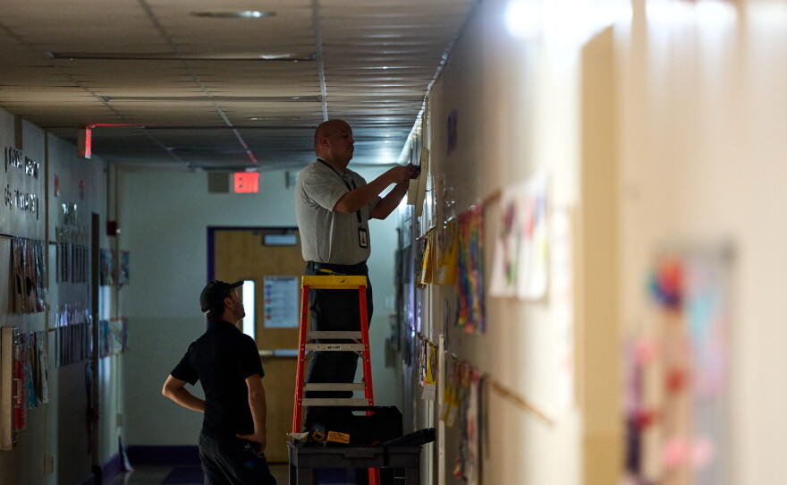 Maintenance workers work on repairs at Olds Elementary School on Wednesday October 7, 2026.