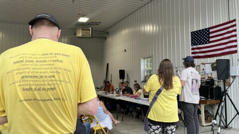 A Clinton Twp. resident wears a shirt with a section from Pennsylvania's Constitution on the back that says "The people have a right to clean air, pure water, and to the preservation of the natural, scenic, historic and esthetic values of the environment..." That section has become a rally cry for those opposed to data center development in the state.