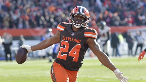 FILE - In this Nov. 11, 2018 file photo Cleveland Browns running back Nick Chubb celebrates after scoring a 92-yard touchdown in the second half of an NFL football game against the Atlanta Falcons in Cleveland. 