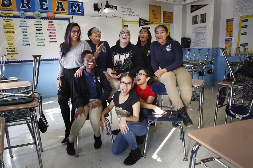 English teacher Shehtaz Huq and the eighth-graders at Bronx Prep Middle School behind the winning podcast "Sssh! Periods."