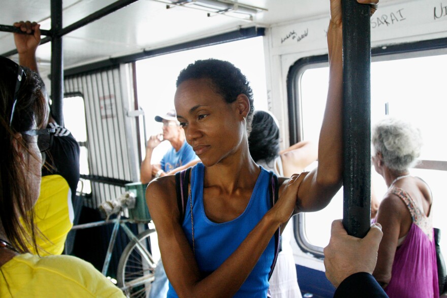 Yusimí Rodríguez López, an author and journalist, aboard a ferry on the way to Regla, a poor and largely black neighborhood.