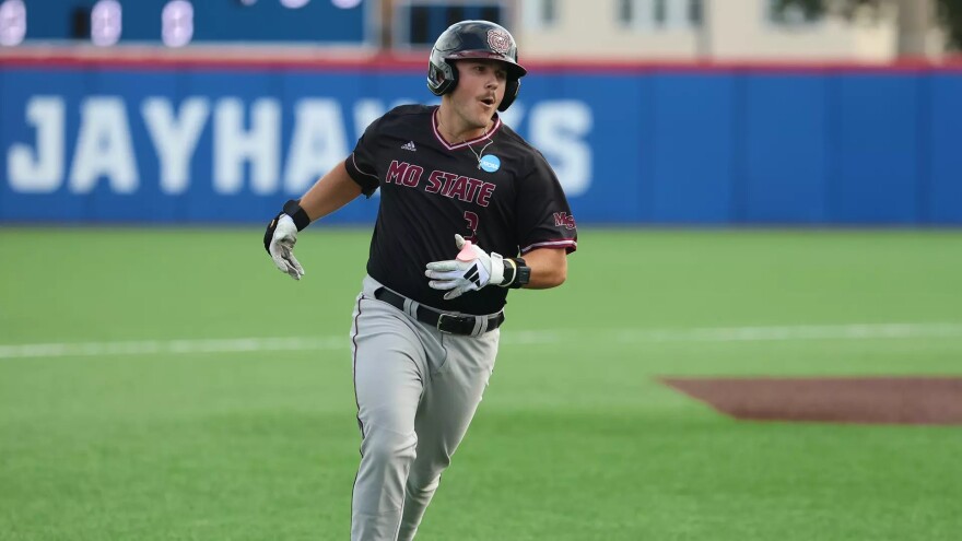 Bryce Cermenelli runs the bases after a home run against Arkansas in the Lawerence Regional